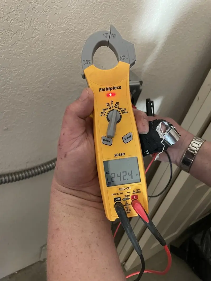 Voltage testing with clamp meter during Hot Tub / Pool Electrical Wiring in Virginia